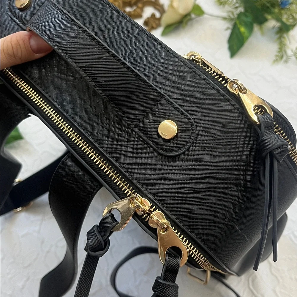 Calpak Black Backpack with Gold Zippers